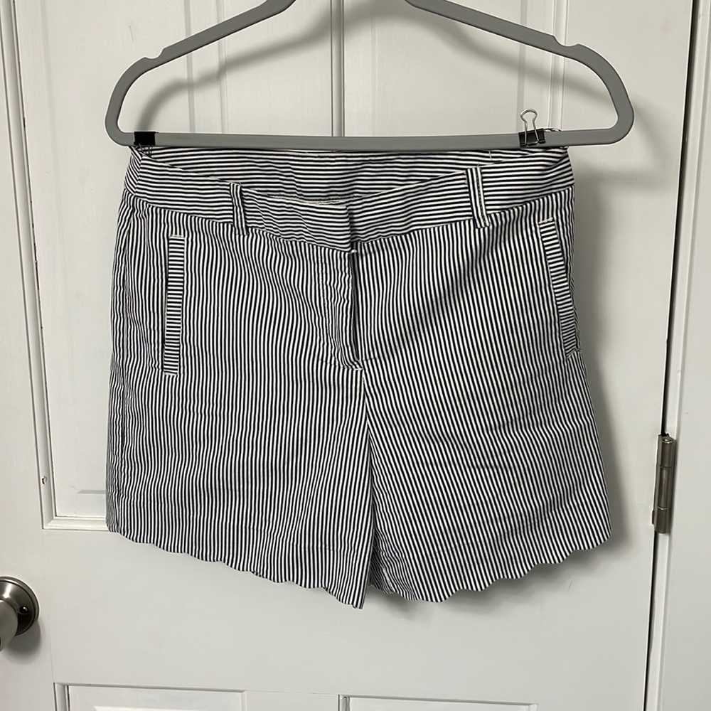 Striped shorts with scalloped edges